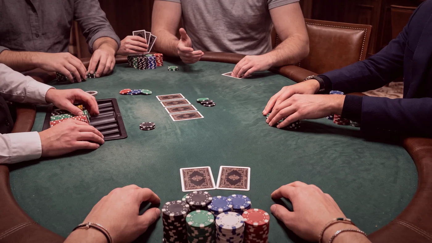 One card table laid with chip trays, waiting on the evening’s first booking.